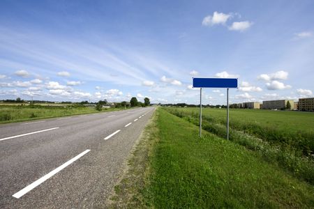 Country highway and blank city name signの写真素材