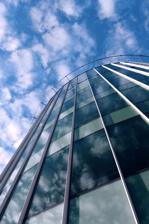 Modern glass architecture taken from below  の写真素材