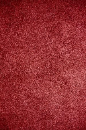 Red plaster wall backgroundの写真素材