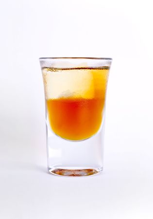 Short drink of hard liquor with iceの写真素材
