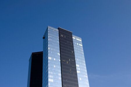 Two scyscrapers on blue sky background horizontalの写真素材