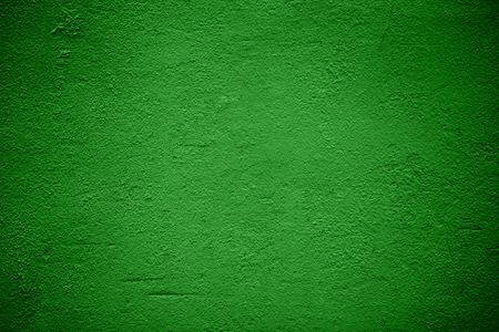 Green plaster wall backgroundの写真素材