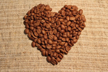Heart of coffee beans on sackingの写真素材