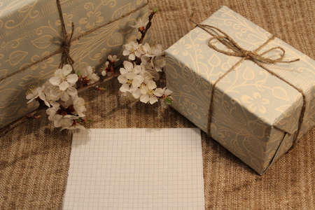 Note, gift and blossom branchの写真素材
