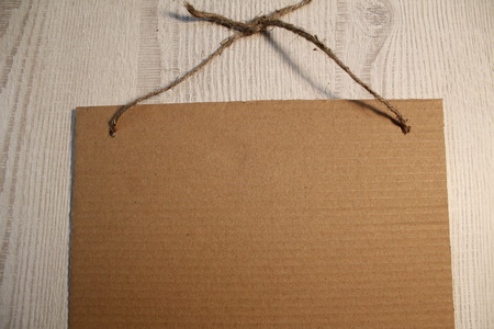 Cardboard on the ropeの写真素材