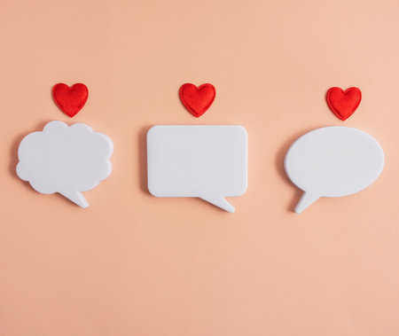Chat icons with hearts on a light background. The concept of modern dating. Social media network concept. love letters. dating online. modern love. copyspace.の写真素材