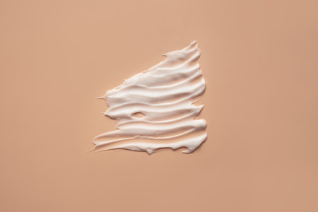 Cosmetic smear of cream texture on a beige background. Skin care. Copy space.の写真素材