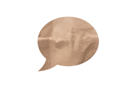 Isolated, crumpled beige sheet of paper in the form of a chat icon. Thought concept. Background for...
