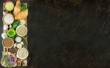 Cereals and vegetables on a wooden stand. Healthy eating Great food. Vegetarian food. Food background. Dark background. Banner. Copy space.の写真素材