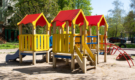 Bright playground on a spring day. Empty playground without people.の写真素材