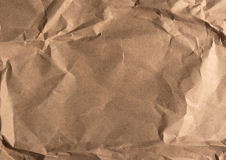 Beige paper texture. Crumpled paper background.の写真素材