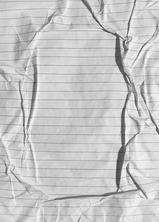 White paper texture. Crumpled paper background. Ruled sheet from notebook. Copy space.の写真素材