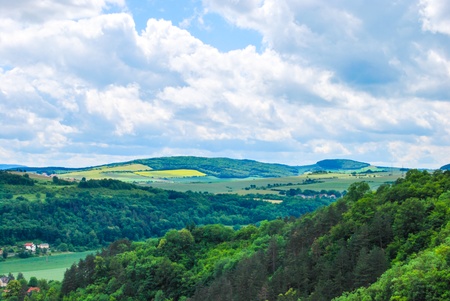 Karlstejn castle on green hill, Prague, Czech Republicの写真素材