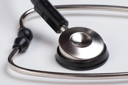 Stethoscope Close up on a white background with a blue tintの写真素材