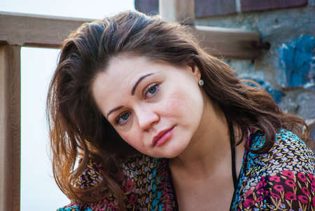 young woman in dress, outdoors, close upの写真素材