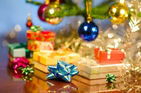 christmas gifts under treeの写真素材