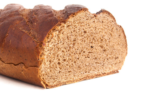 cut brown bread isolated on white