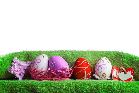 Easter decoration. Background with eggs and Turkish towel isolated on white with space for text.