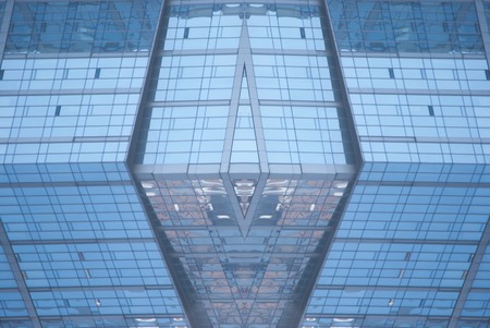 digitally transformed photo of modern office building. Business background.のeditorial素材