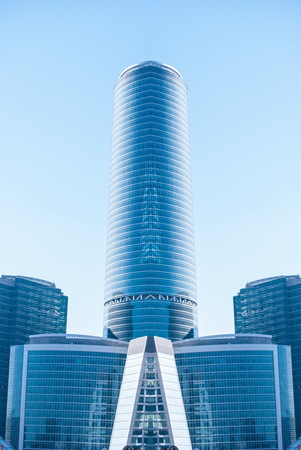digitally transformed photo of modern office building. Business background.のeditorial素材