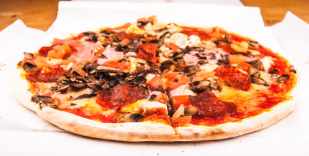 Pizza on tableの写真素材