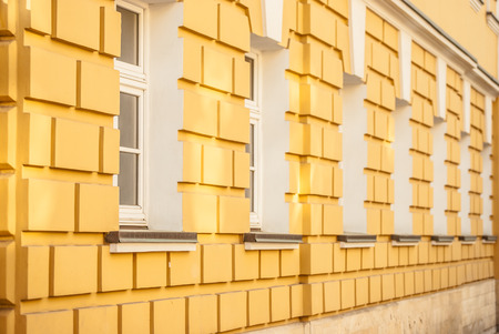 perspective view on windows of historical buildingの写真素材