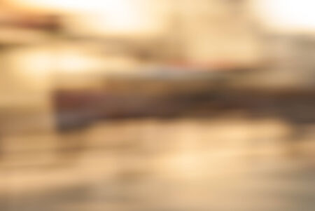 City commuters. High key blurred image of workers going back home after work. Unrecognizable faces, bleached effect.の写真素材