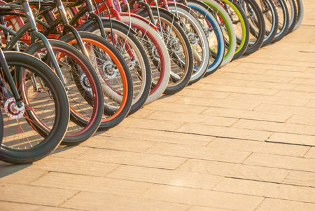 Bycicles wheels on street, close-up