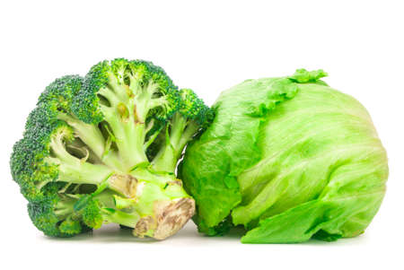 Green cabbage and broccoli isolated on white backgroundの写真素材