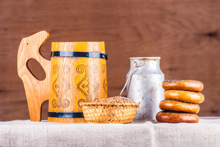 Rural kitchen scene. Breakfast on burlap against wood.の写真素材