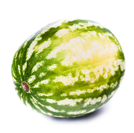 Green ripe watermelon, uncut, isolated on white backgroundの写真素材