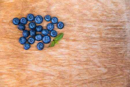 blueberry on woodの写真素材