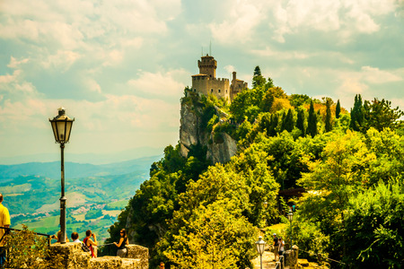 Beautiful view of the medieval fortress De La Fratta or Cesta overlooking the green hills of San Marino republic.のeditorial素材