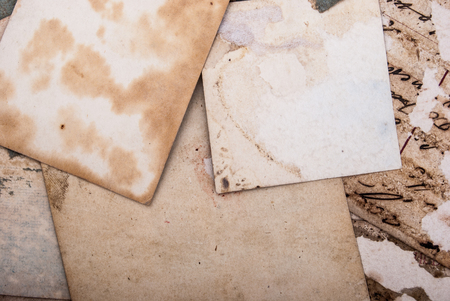 Backs of old photographs. Aged paper background.の写真素材