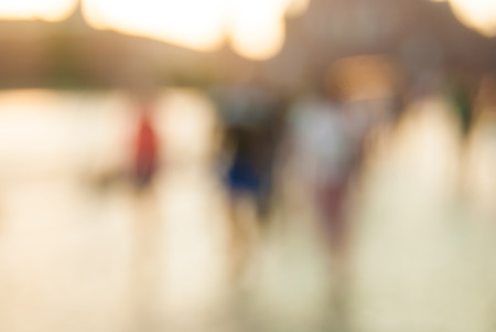 City commuters. High key blurred image of workers going back home after work. Unrecognizable faces, bleached effect.の写真素材