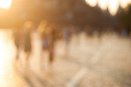 City commuters. High key blurred image of workers going back home after work. Unrecognizable faces,...