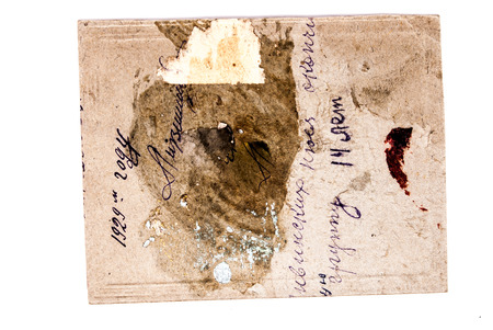 Backs of old photographs. Aged paper background.の写真素材