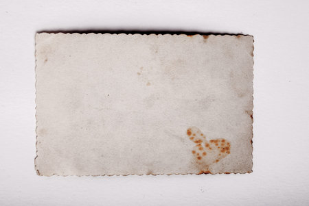 Backs of old photographs. Aged paper background.