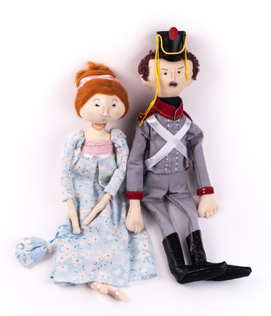 Textile toys. Couple of dolls in historic costumes of Napoleon era. Soldier and woman in gown.の写真素材