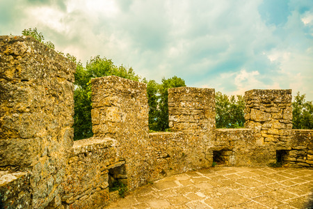 Stone wall of the medieval fortress De La Fratta or Cesta, San Marino republic.のeditorial素材