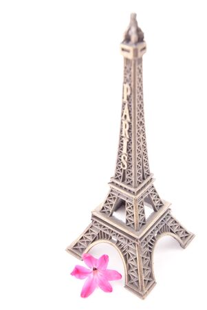 Eiffel tower with pink flower isolated on white backgroundの写真素材