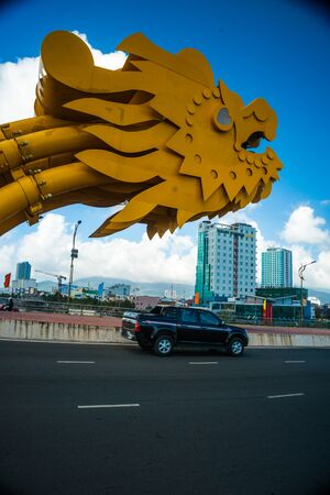 DANANG CITY, VIETNAM - FEBRUARY 2, 2015 - Traffic on the The Dragon Bridge on February 2, 2015. The Bridge has recently received Engineering Exellence Award (EEA) in the USAのeditorial素材