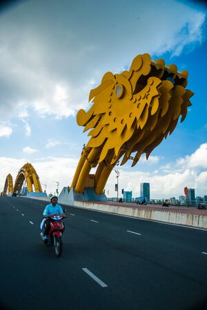 DANANG CITY, VIETNAM - FEBRUARY 2, 2015 - Traffic on the The Dragon Bridge on February 2, 2015. The Bridge has recently received Engineering Exellence Award (EEA) in the USAのeditorial素材