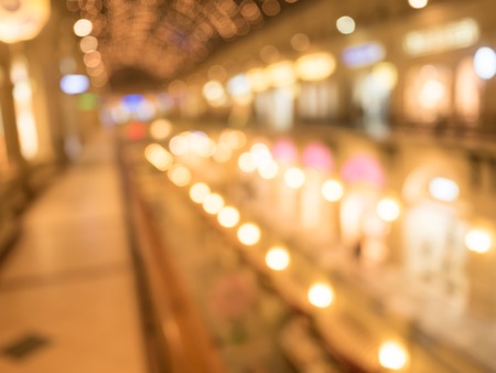 Defocused interior of a large luxury shopping center. Abstract background for web usage.の写真素材