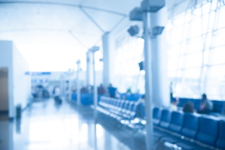 Blurred photo of an airport terminal. Blurred for topics of Industrial architecture and transportation.の写真素材