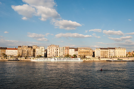 Cityscape of Budapest in warm sunlight with facades looking out to the Danube river.の写真素材