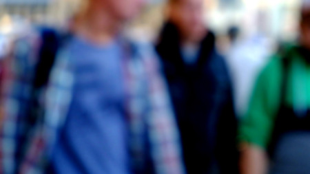 Blurred image of workers going back home after workの写真素材