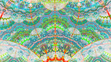 Ethnical lace ornament. Intricate symmetrical pattern with many colorful elements. Background texture for invitations, wedding cards or promotional imagery.の写真素材