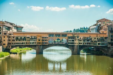 Pone Vecchio over Arno river in Florence, Italy. Beautiful image of italian renaissance architecture. Travel imagery of Italy.の写真素材