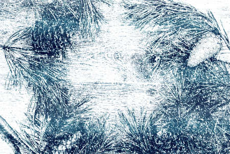 Christmas fir tree with cones on a wooden background, selective focus and place for text. Tonedの写真素材